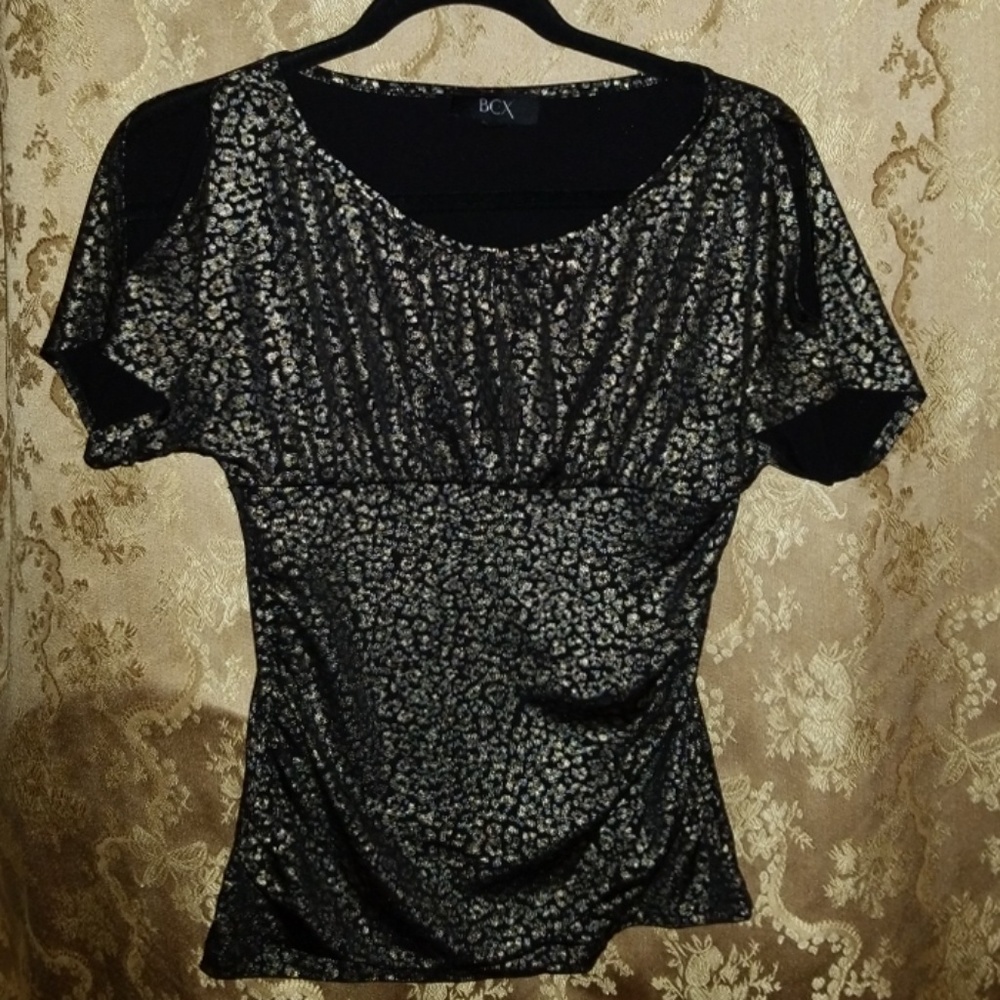 Gold top with short mid-open sleeves